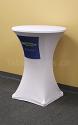 This 30 inch diameter round white fire resistant economy spandex stretch cocktail table cover displays a multi colour pantone pms dye sub print on the front for economical yet stylish branding