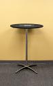 Black 30 inch Round Table Topper Cap with White Logo on a “Cruiser 3042” cocktail table
