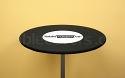 The topper cap slips over the table top and elastic holds it snug for easy decor or display theming
