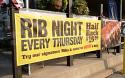 The 4 foot high x 16 foot wide mesh vinyl advertising banner shown here gives big impact, but still allows the wind to pass through