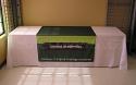 This 48 inch wide x 80 inch high table runner has a custom pantone green colour background over the entire runner with logo and tag line visible on both sides of the 8 foot wide table