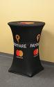 Stretch Fit spandex 30 inch diameter high boy bistro style cocktail table cover with custom printed logo and pantone background colour all over the entire front, top and side panels of the cloth
