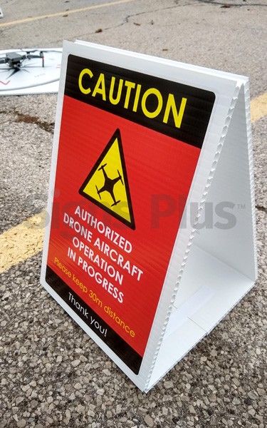 These Caution Drone Operatons landing area signs help to keep curious bystanders away and minimize pilot distraction